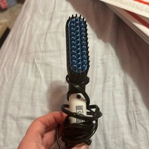 Hair straightener brush.